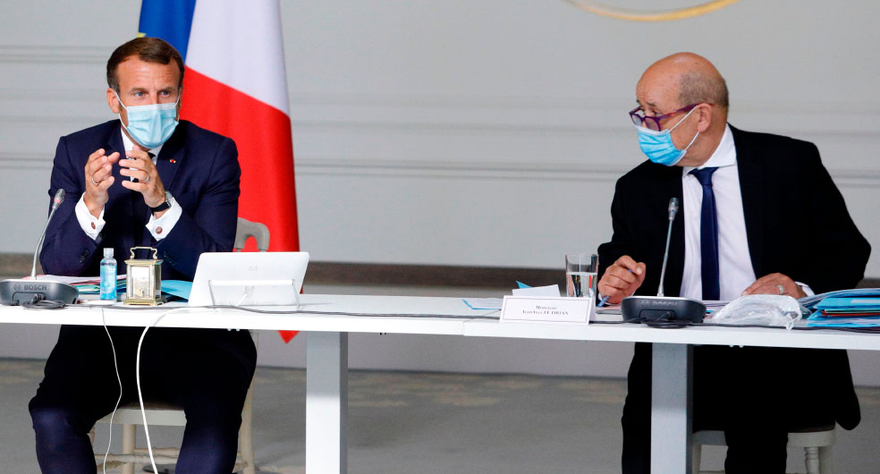 Fransa Cumhurbaşkanı Emmanuel Macron ve Dışişleri Bakanı Jean- Yves Le Drian