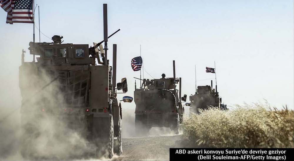 ABD askeri konvoyu Suriye'de devriye geziyor (Delil Souleiman-AFP/Getty Images)